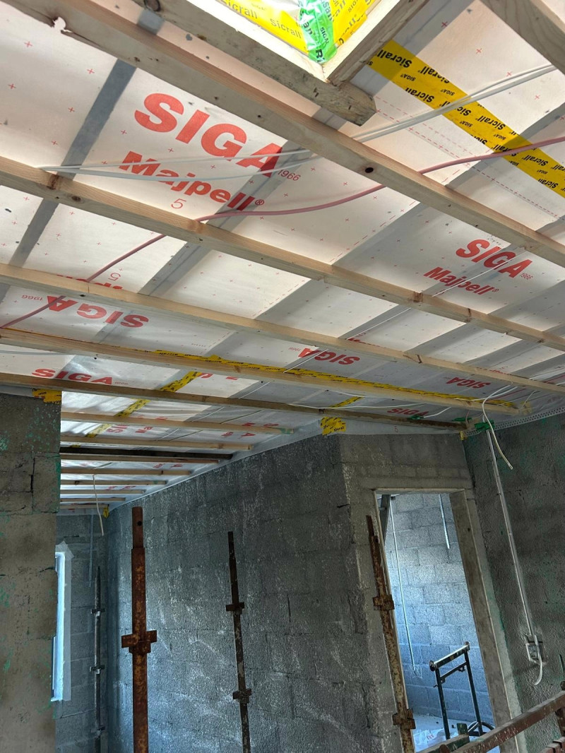 Vapour control layers in ceiling - part of Air Tightness installation by Midland Insulation